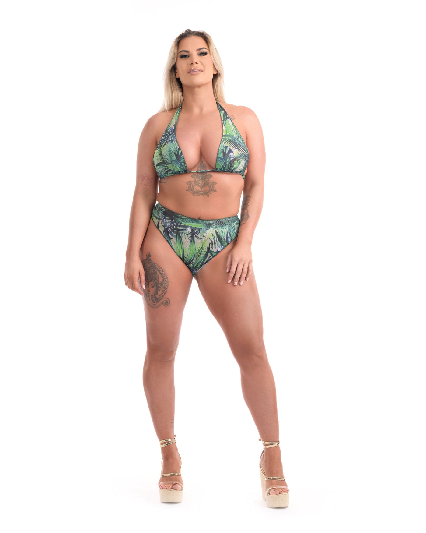 Girl in green bikini standing forward
