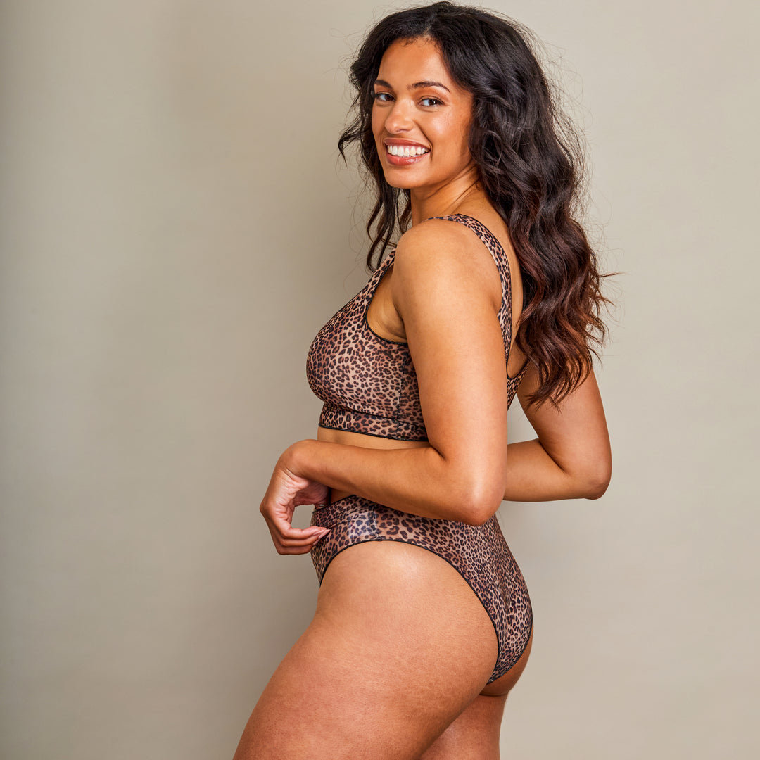 Girl showing leopard print bikini from the side