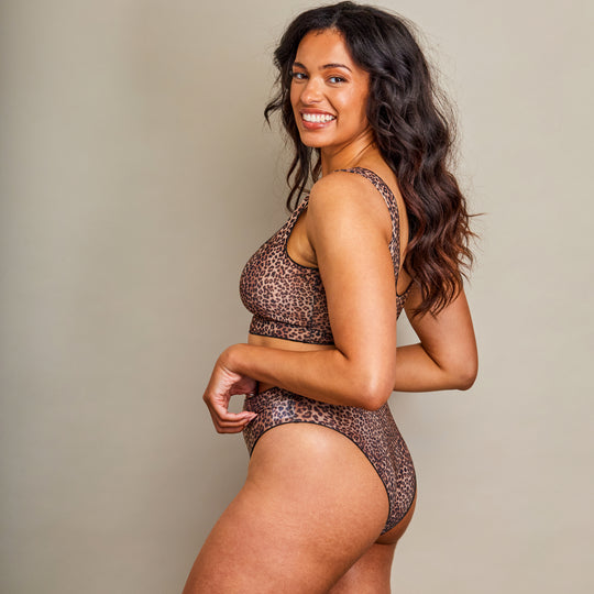 Girl showing leopard print bikini from the side